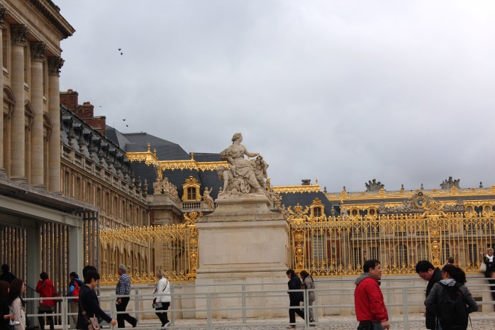 Statue near the main entrance of Versailles Palace