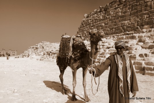 A random poser in Giza, who later asked for money since he posed for my camera and he was the one who kept insisting that I take picture of him and his camel