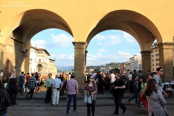 Standing on Ponte Vecchio in Florence, Italy