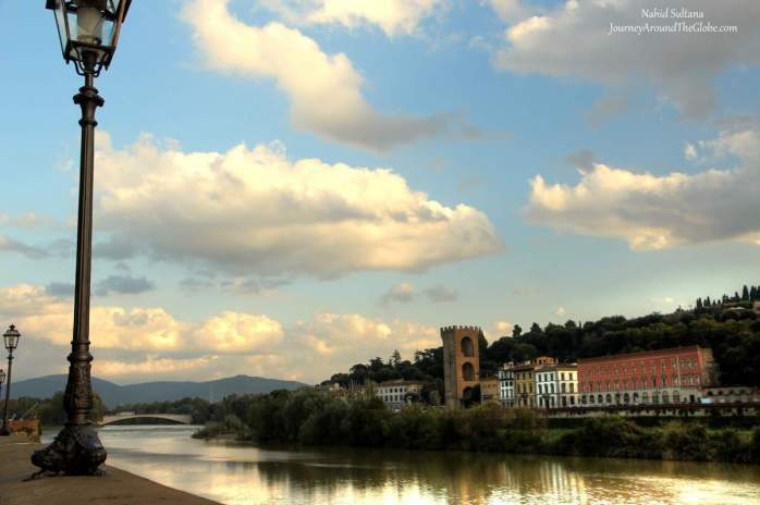 Walking by River Arno in Florence, Italy