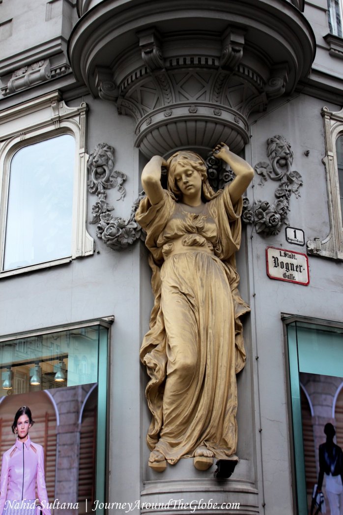 Beautiful statue outside an old building of Vienna