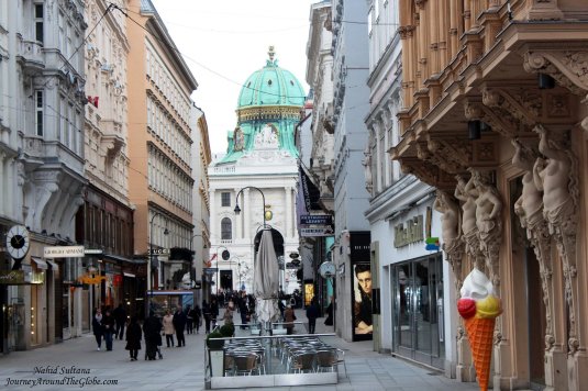 Innere Stadt or 1st District of Vienna, you can see the green dome of Hofburg Palace