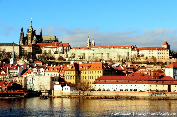 Steeples of St. Vitus Cathedral and Prague Castle from Charles Bridge in Prague