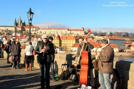 Bustling life of Charles Bridge during day 