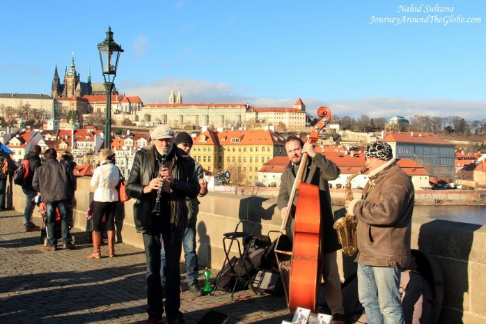 Bustling life of Charles Bridge during day 