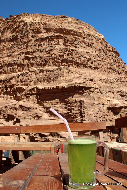 My glass of lemonade with a hint of mint on top of the mountain on our way to the monastery in Petra, Jordan