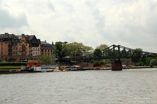 River Main and pedestrian Iron Bridge in Frankfurt, Germany