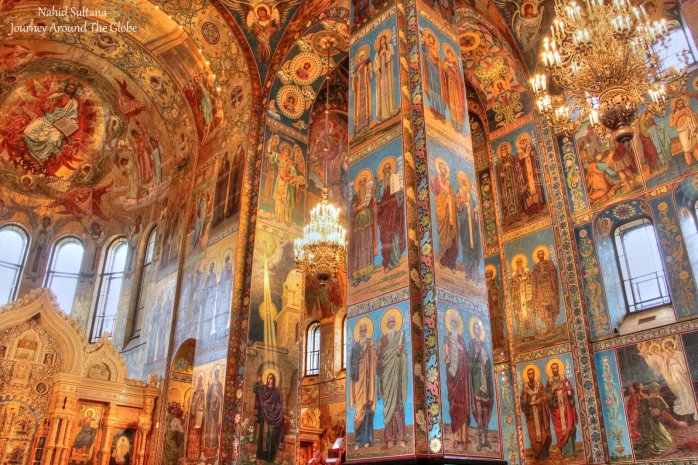 Gorgeous frescoes and chandeliers inside Church on Spilled Blood in St. Petersburg