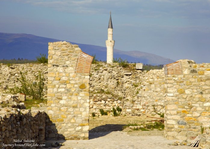 Some ruins of Kale Fortress and minaret of Mustafa Pasha Mosque in the back in Skopje, Macedonia