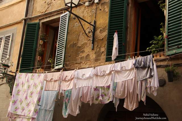 Hanging laundry from the windows in Old Siena, Italy